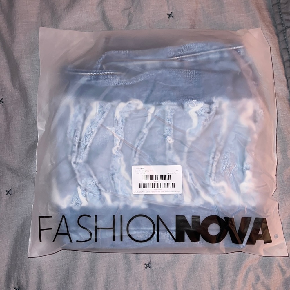 Straight leg fashion nova jeans size 11 extremely distressed light wash